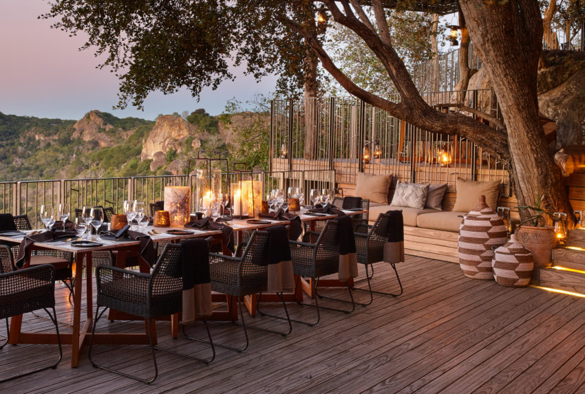 singita_pamushana_lodge_-_dinner_table_on_deck_overlooking_dam