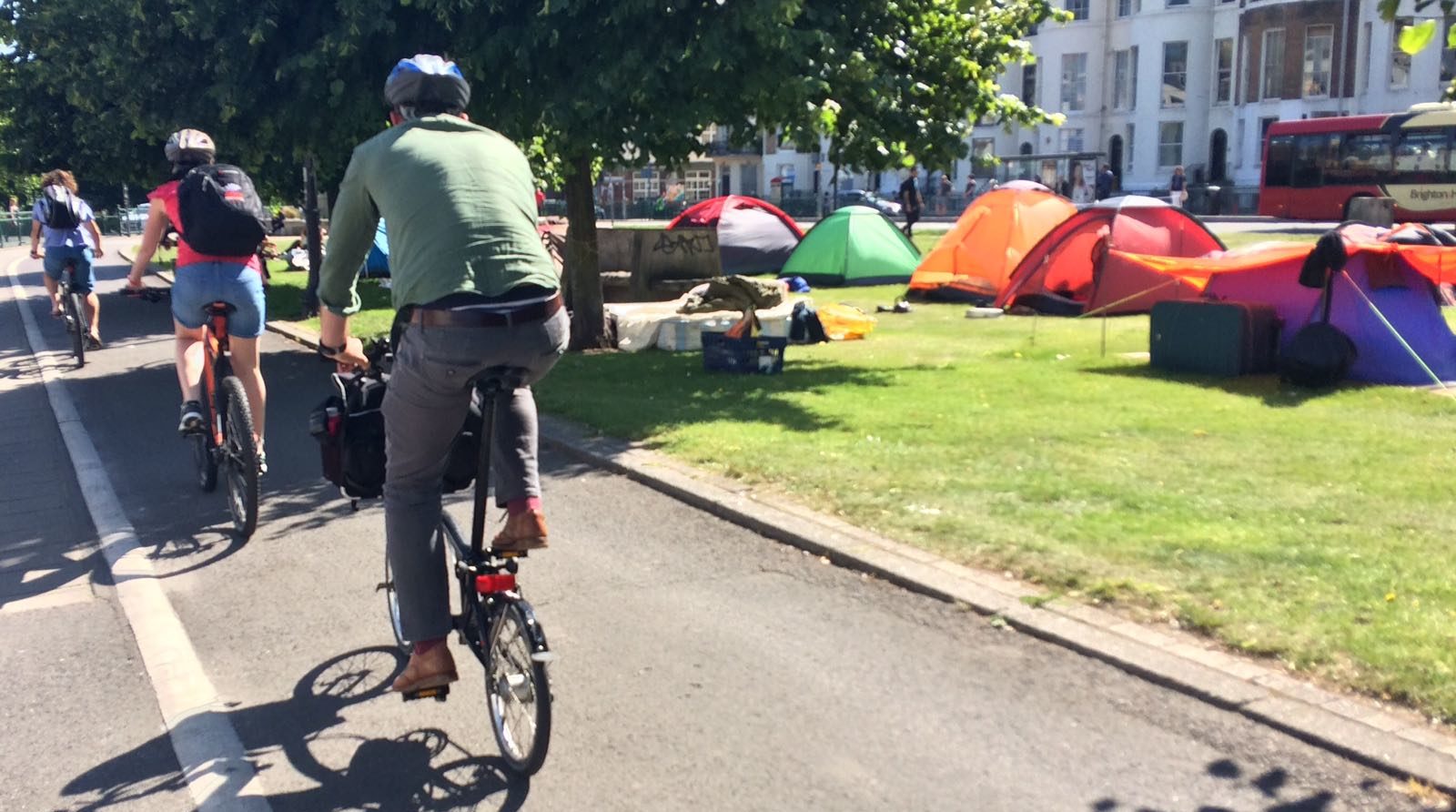 Journeys by Design team cycling through Brighton to the beach for a barbecue